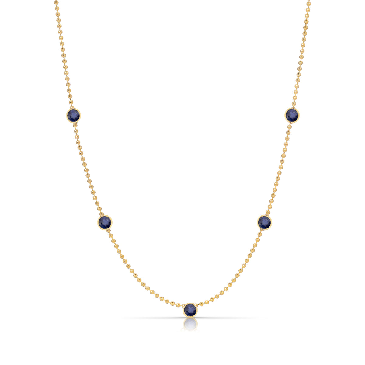 A Quintet Birthstone Layering Necklace - Yellow Gold in Sapphire - September on a white background.