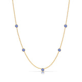 A Quintet Birthstone Layering Necklace - Yellow Gold in Tanzanite - December on a white background.