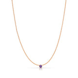 A Single Birthstone Layering Necklace - Rose Gold in Amethyst on a white background.