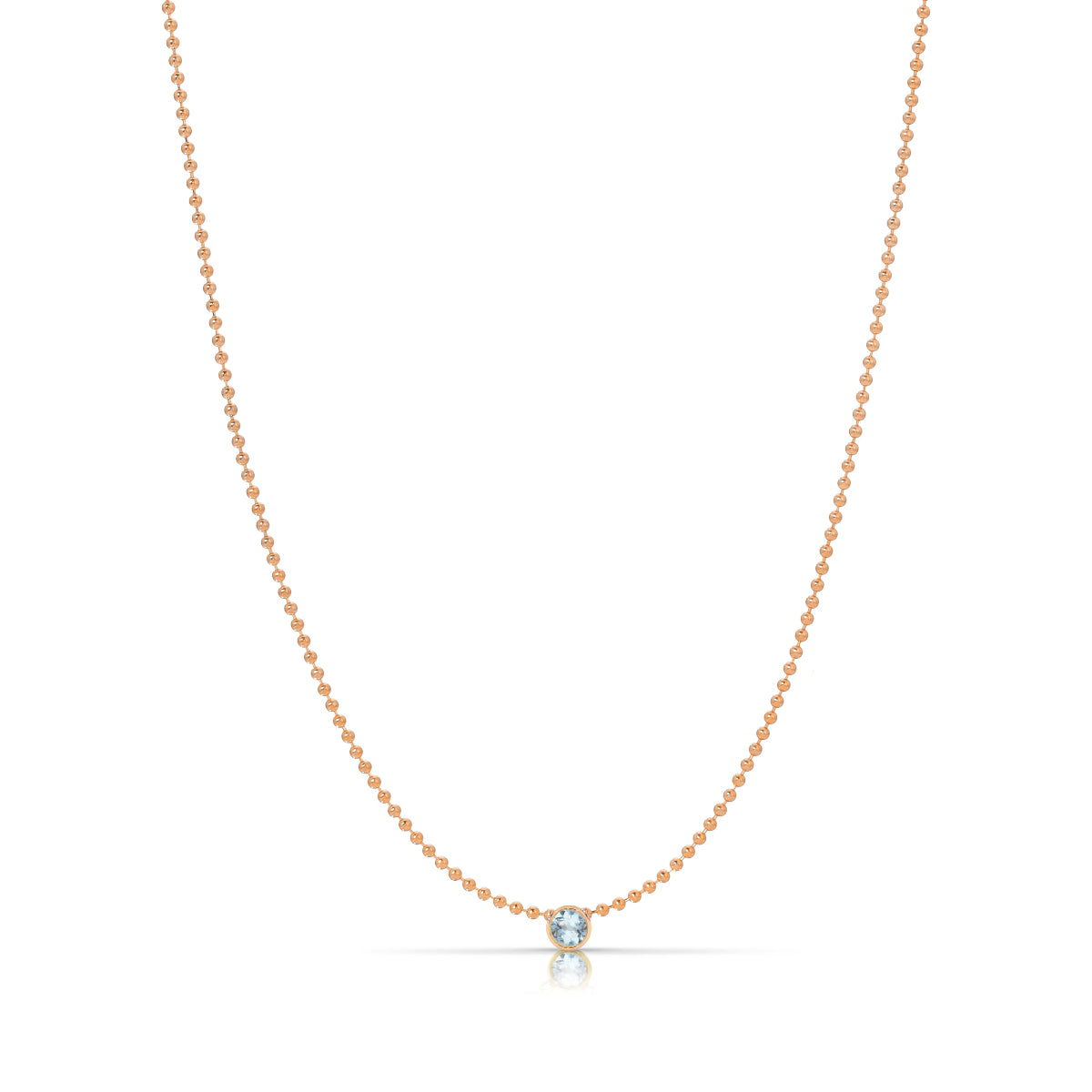 A Single Birthstone Layering Necklace - Rose Gold in Aquamarine on a white background.