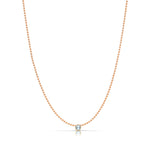 A Single Birthstone Layering Necklace - Rose Gold in Aquamarine on a white background.