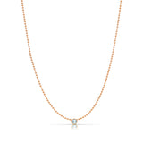 A Single Birthstone Layering Necklace - Rose Gold in Aquamarine on a white background.