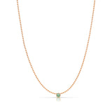 A Single Birthstone Layering Necklace - Rose Gold in Emerald on a white background. 