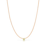 A Single Birthstone Layering Necklace - Rose Gold in Peridot on a white background.