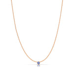 A Single Birthstone Layering Necklace - Rose Gold in Tanzanite on a white background.