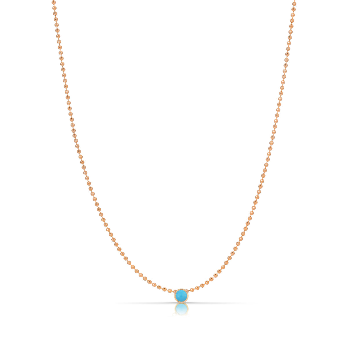 A Single Birthstone Layering Necklace - Rose Gold in Turquoise on a white background. 