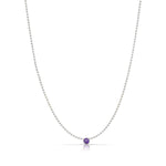 A Single Birthstone Layering Necklace - White Gold in Amethyst on a white background.