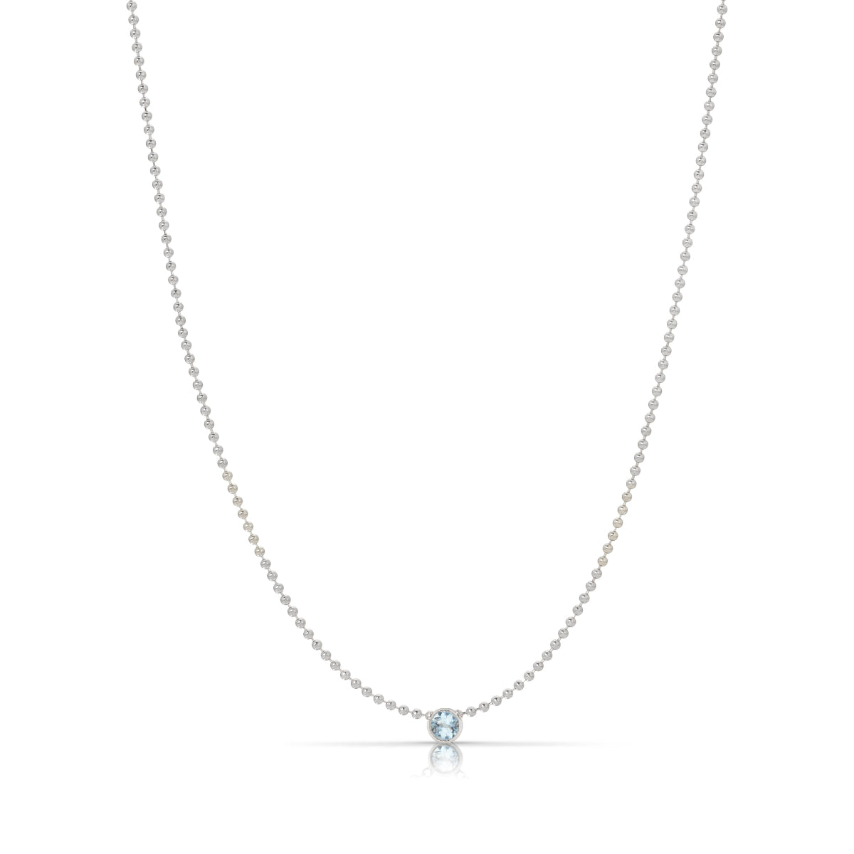 A Single Birthstone Layering Necklace - White Gold in Aquamarine on a white background.