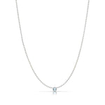A Single Birthstone Layering Necklace - White Gold in Aquamarine on a white background.
