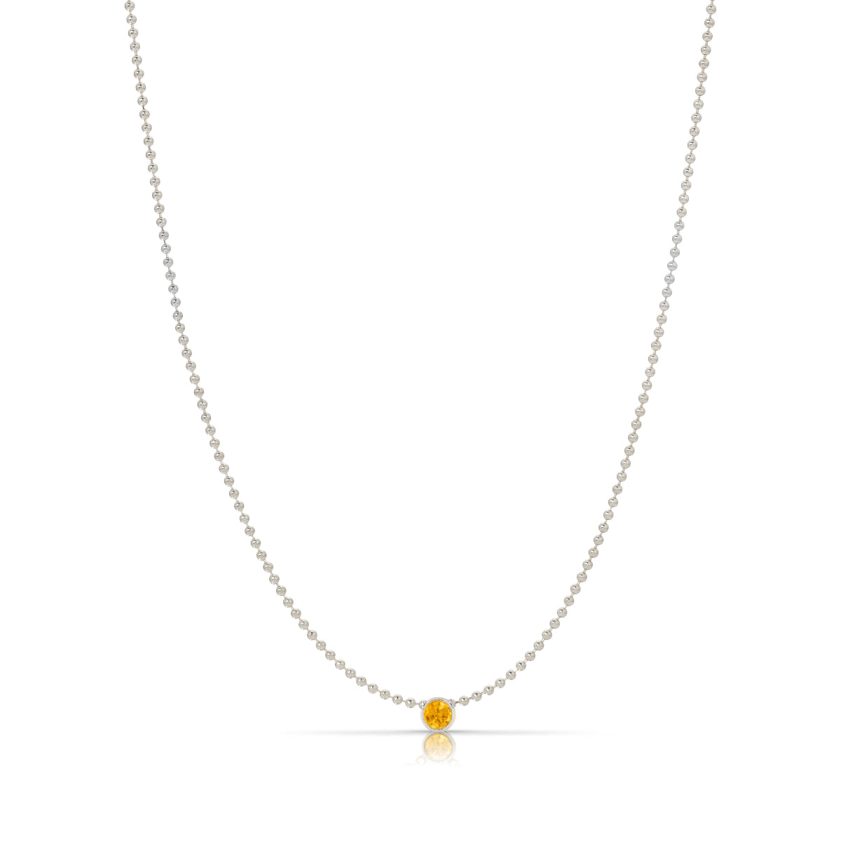 A Single Birthstone Layering Necklace - White Gold in Citrine on a white background.