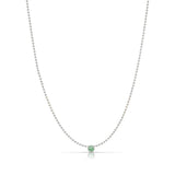 A Single Birthstone Layering Necklace - White Gold in Emerald on a white background.