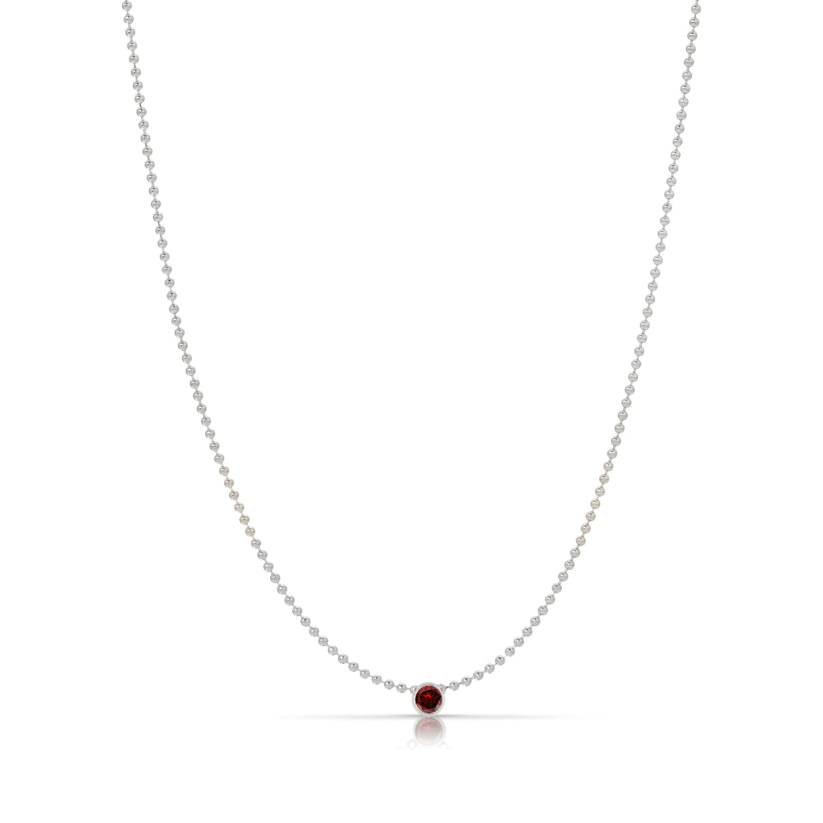 A Single Birthstone Layering Necklace - White Gold in Garnet on a white background.