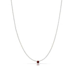 A Single Birthstone Layering Necklace - White Gold in Garnet on a white background.