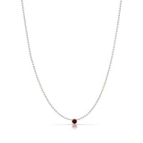 A Single Birthstone Layering Necklace - White Gold in Garnet on a white background.