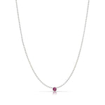 A Single Birthstone Layering Necklace - White Gold in Ruby on a white background.