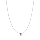 A Single Birthstone Layering Necklace - White Gold in Ruby on a white background.