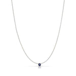 A Single Birthstone Layering Necklace - White Gold in Sapphire on a white background.