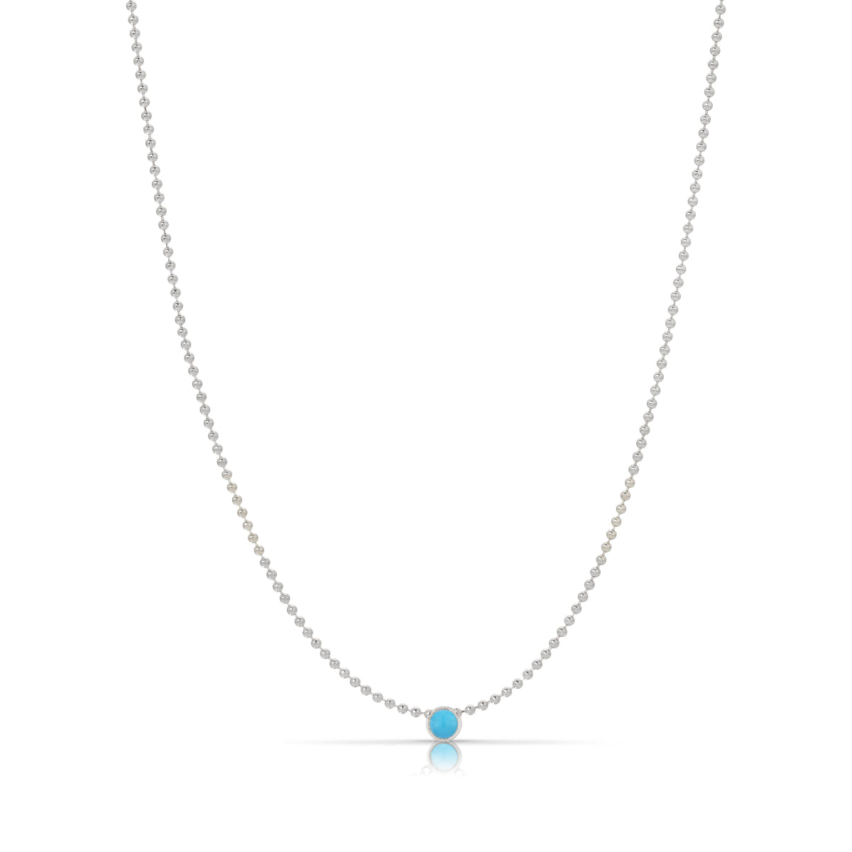 A Single Birthstone Layering Necklace - White Gold in Turquoise on a white background.