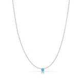 A Single Birthstone Layering Necklace - White Gold in Turquoise on a white background.