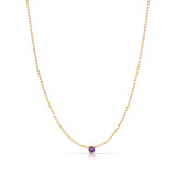 A Single Birthstone Layering Necklace - Yellow Gold in Amethyst - February on a white background.
