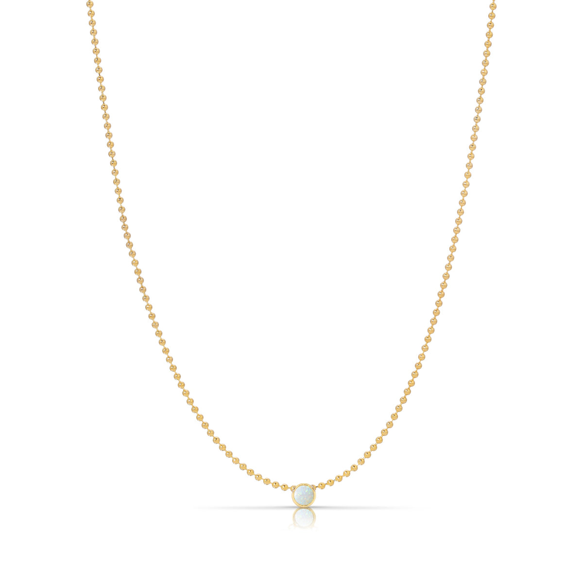 A Single Birthstone Layering Necklace - Yellow Gold in Opal - October on a white background. 