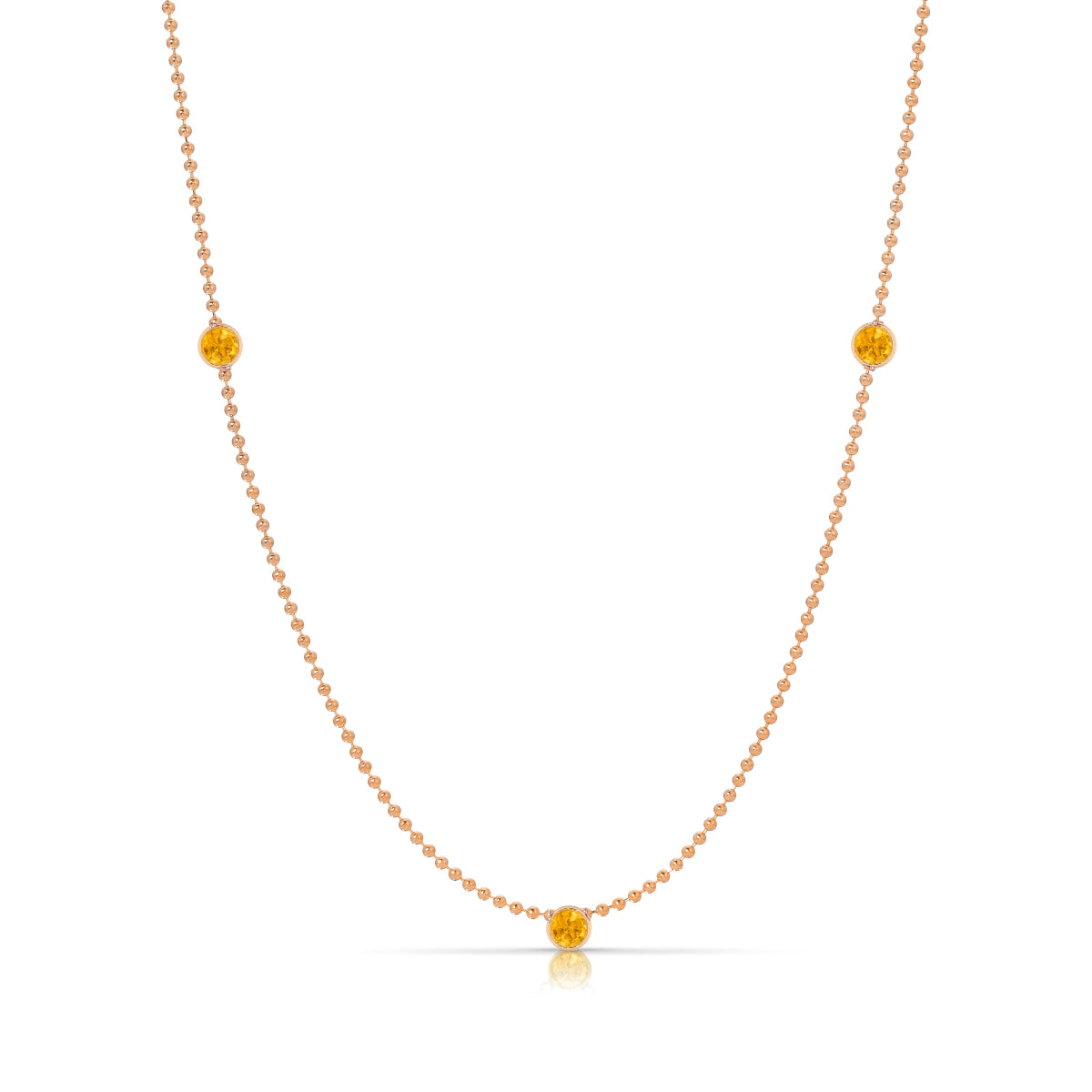A Triple Birthstone Layering Necklace - Rose Gold in Citrine - November on a white background.