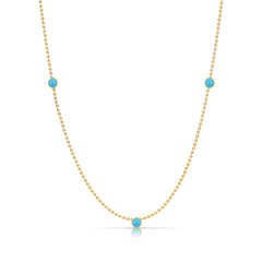 A Triple Birthstone Layering Necklace - Yellow Gold in Turquoise - December on a white background.