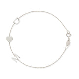 A white gold Custom Gold Bracelet – 3 Letters with the letters D and M and a heart charm, on a white background. 